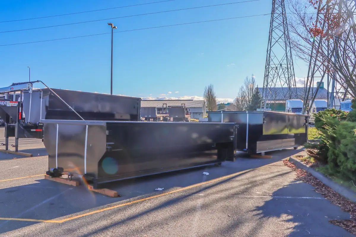 Roll-off dumpster ready for waste disposal at job site for Concrete Dumpster Rental in Granite Shoals